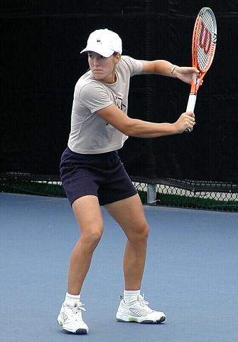 Justine Henin tijdens een tenniswedstrijd