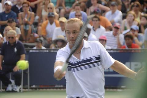 Olivier Rochus in actie tijdens een tenniswedstrijd