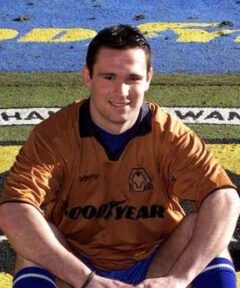 Cédric Roussel tijdens een voetbalwedstrijd in 2001